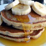 Wholesome Whole Wheat Banana Pancakes Drizzled with Maple