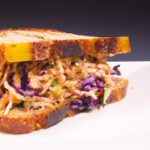 Savor the Bold Flavors of BBQ Tempeh & Cabbage Slaw Sandwich