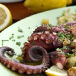 Savoring Grilled Octopus: Zesty Lemon & Garlic Delight