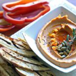 Roasted Red Pepper Hummus with Toasty Pine Nut Twist