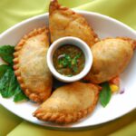 Thai-Inspired Empanadas Paired with Creamy Coconut Peanut Dip
