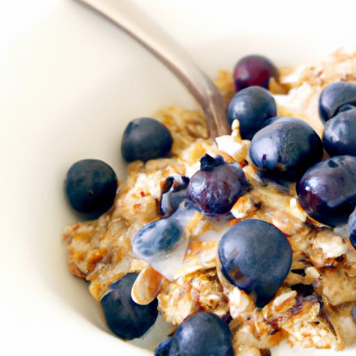 Wholesome Oatmeal⁣ Bowls Topped⁣ with Granola & Blueberries