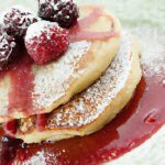 Fluffy Coconut Flour Pancakes Topped with Berry Compote Delight