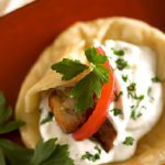 Savor Turkish Flatbreads with Lamb and Creamy Yogurt Flair